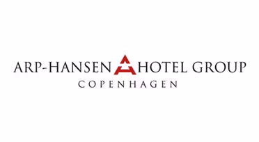 Logo of Arp-Hansen Hotel Group with the text ARP-HANSEN HOTEL GROUP in black capital letters. The letter A in HANSEN is larger and red. COPENHAGEN is written below in smaller black letters.