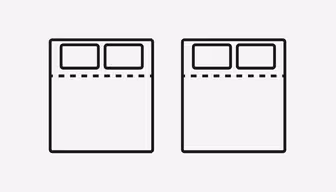 Illustration of two bed icons side by side. Each bed features a dotted line dividing the top section from the bottom, indicating a foldable or adjustable area. Two pillows are placed at the head of each bed. The background is plain.